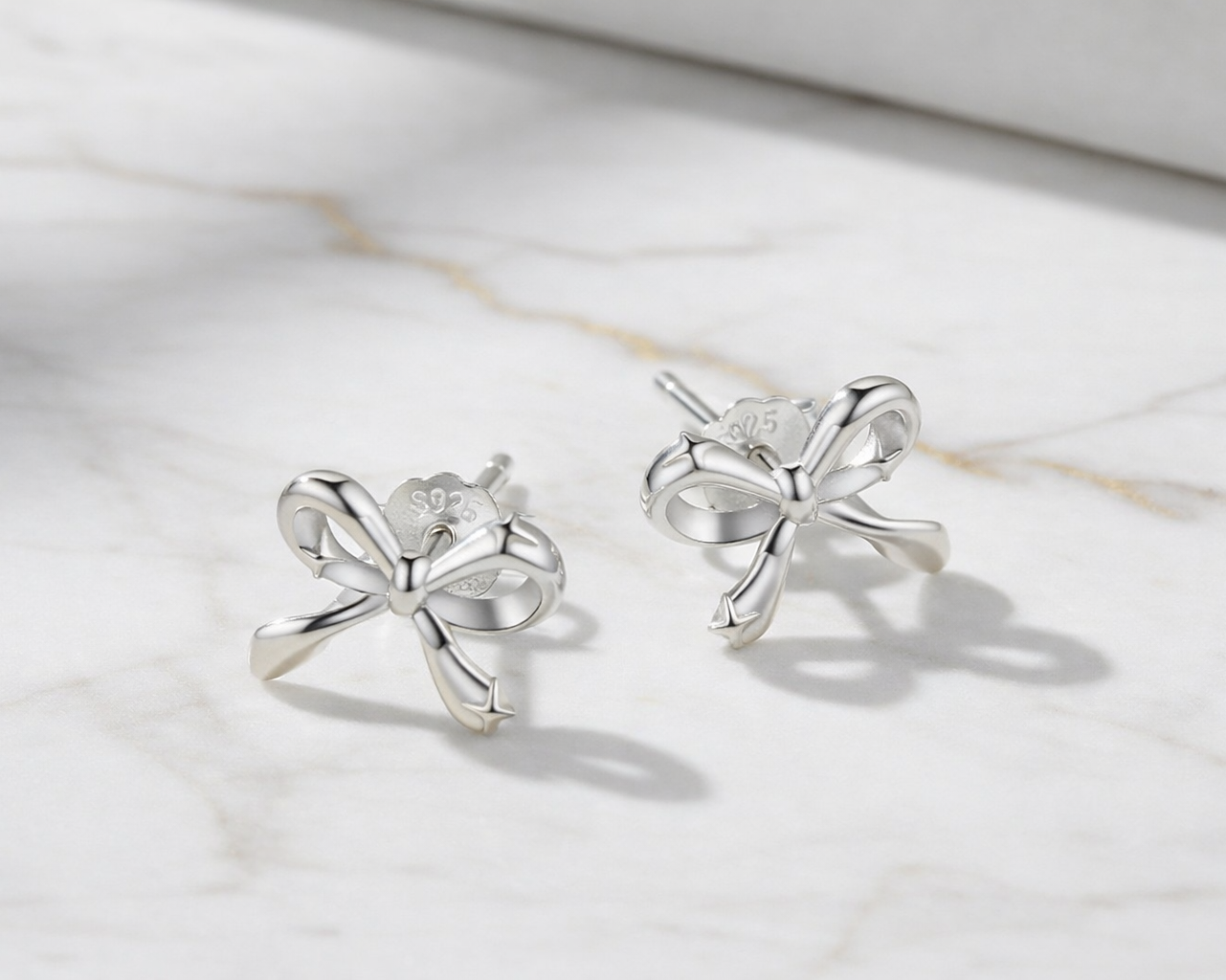 Unica Bow Gold and White-gold plated Earrings